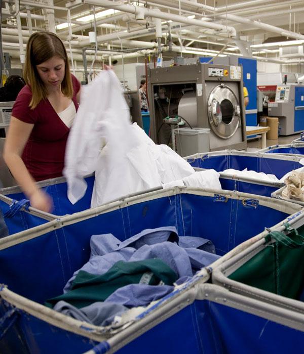 woman sorting laundry